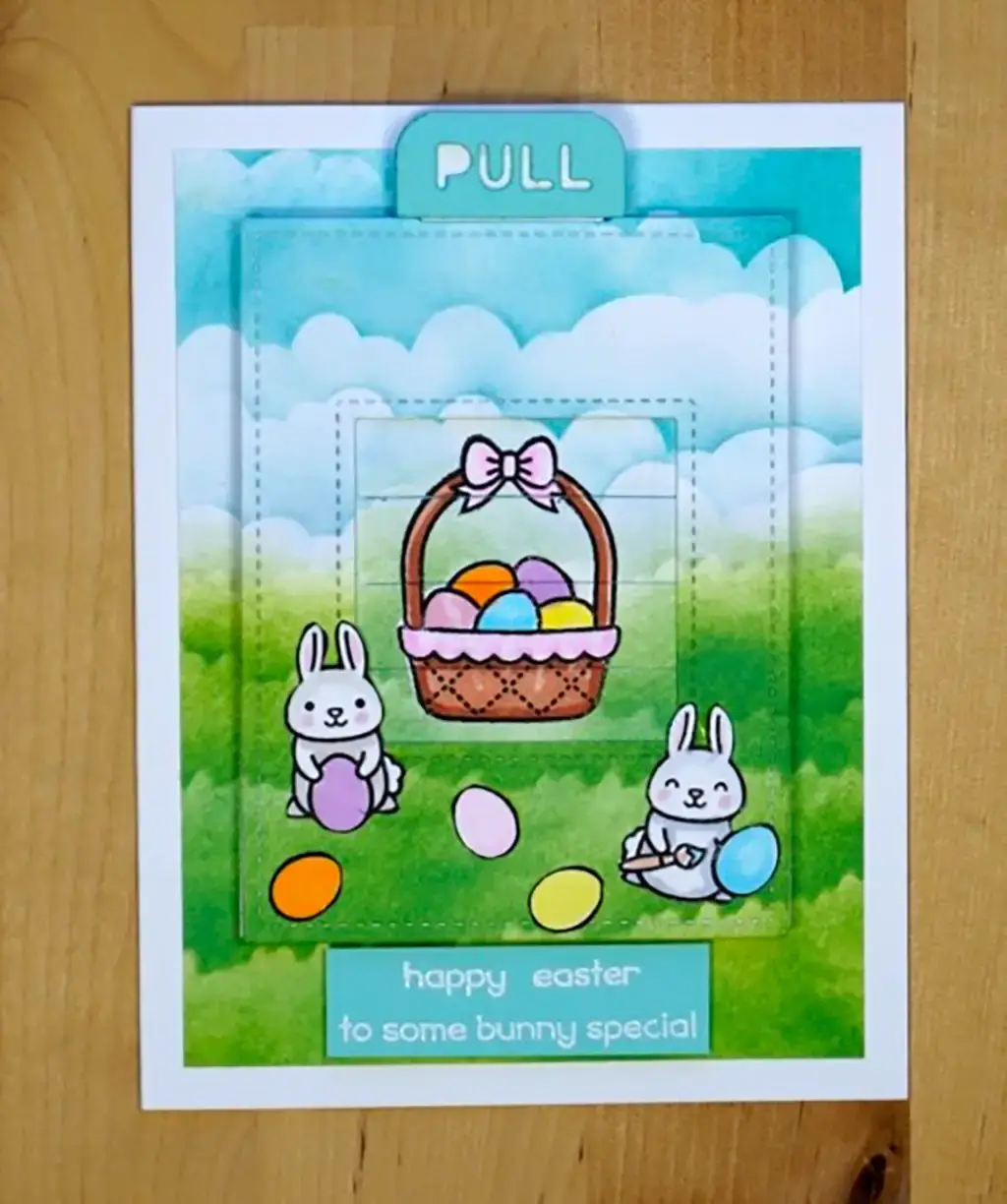 A card with an outrageously cute easter bunny in a basket.