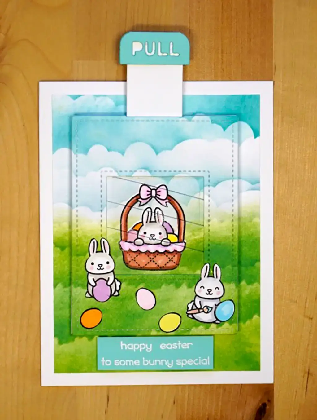 An outrageously adorable card with an Easter bunny in a basket.